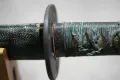 The fuchi bearing an upright circle-enclosed manji crest