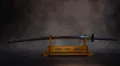The Mantetsu blade in its Shin Guntō mounting, displayed on a stand