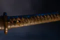 The same-wrapped grip with cherry-blossom menuki