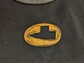 Small bronze spacer piece with irregular cutout