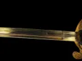 A close view of the blade near the guard
