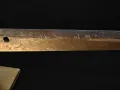 The nakago (tang) showing the signature 兼松 (Kanematsu)