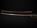 The blade drawn and laid beside its scabbard, showing the full length of both