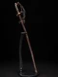 The sheathed sabre standing upright on a display stand