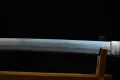 A closer view of the undulating gunome hamon and its soft, misty habuchi