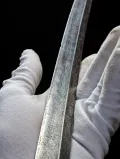 Sighting down the mune, the view that shows the slight bend in the blade